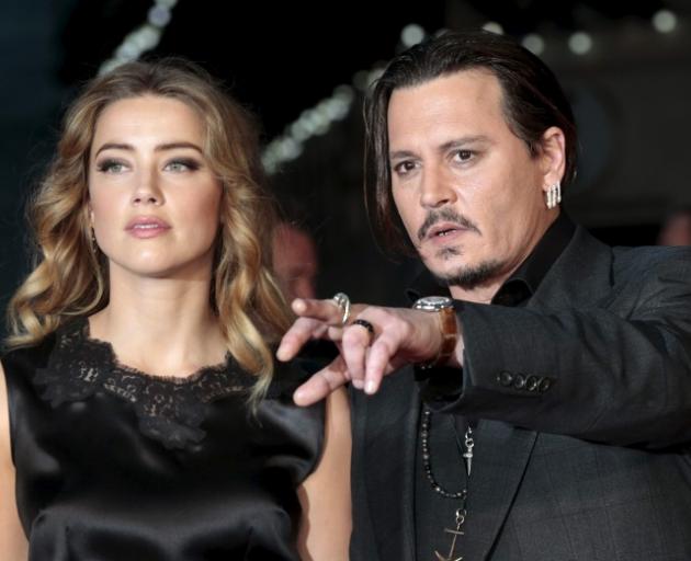 Amber Heard and Johnny Depp. Photo Reuters 