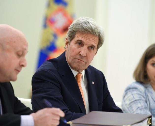 John Kerry (centre) at the meeting with Vladimir Putin. Photo: Reuters 