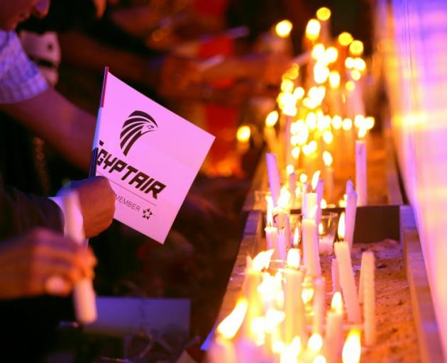 Candles were lit at a vigil in Cairo for victims of the crash. Photo: Reuters 