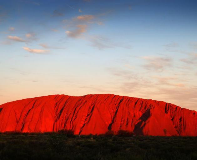 Government funding will go towards protecting sacred sites, native plants and animals near Uluru. Photo: Getty Images