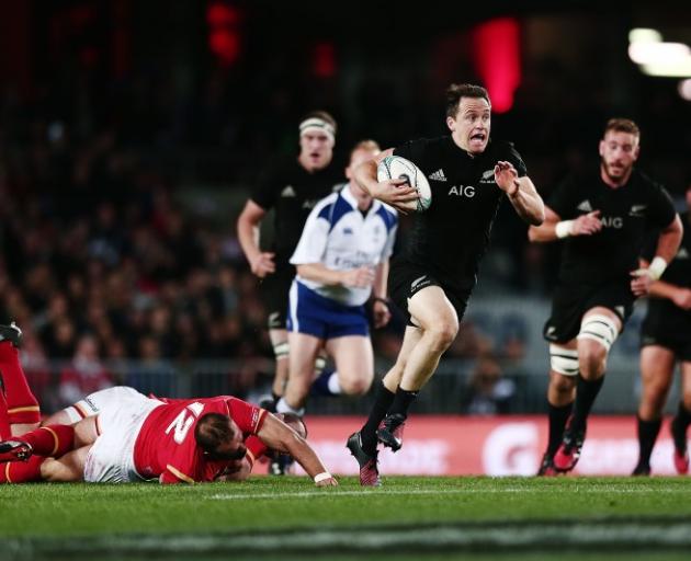 Ben Smith makes a break for it against Wales at the first test in Auckland. Photo: Getty Images 