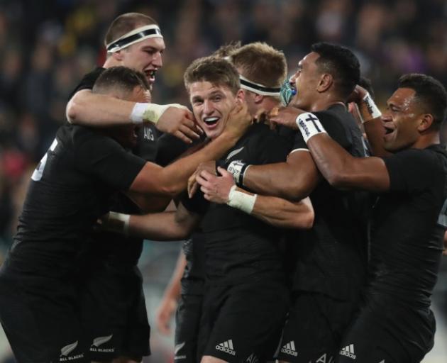 Players celebrate Beauden Barrett's try. Photo: Getty Images