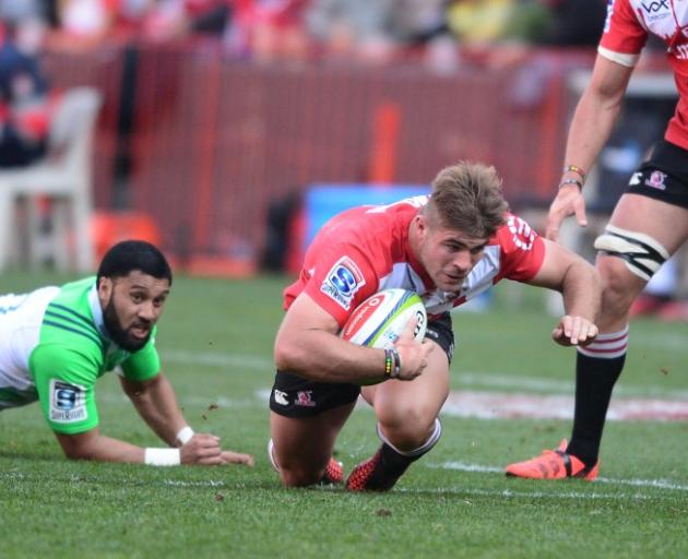 Lima Sopoaga can only watch as Malcolm Marx (right) heads for the tryline. Photo: Getty Images 