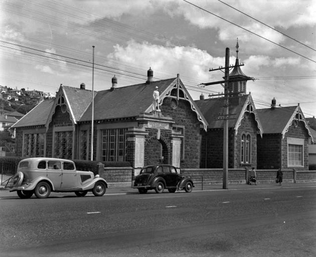 An undated photograph of the old North East Valley School, with the ''ever-present soldier sentinel on top of the memorial arched gate''. PHOTO: EVENING STAR
