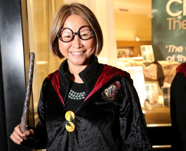 A Harry Potter fan waits for the latest book at a London store. Photo: Reuters 