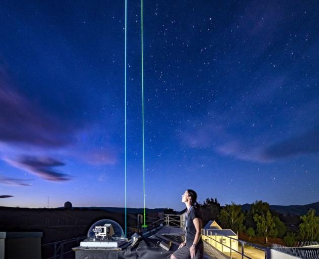 Niwa technician Penny Smale admires the view as the Lidar gathers atmospheric data from the upper atmosphere above Lauder. PHOTO: DAVE ALLEN