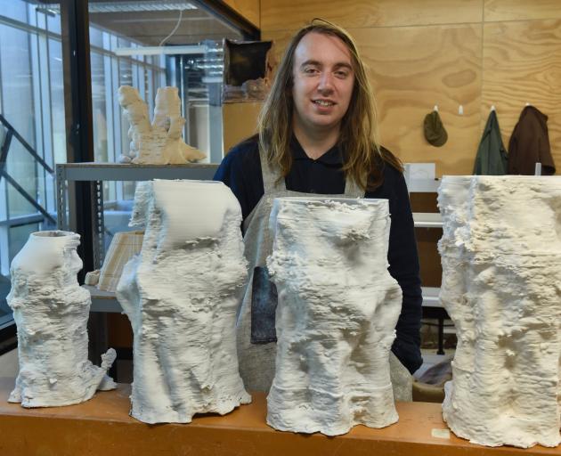 Dunedin Art School graduating masters student Finn Petrie with the ‘‘plant houses’’ he has 3D...