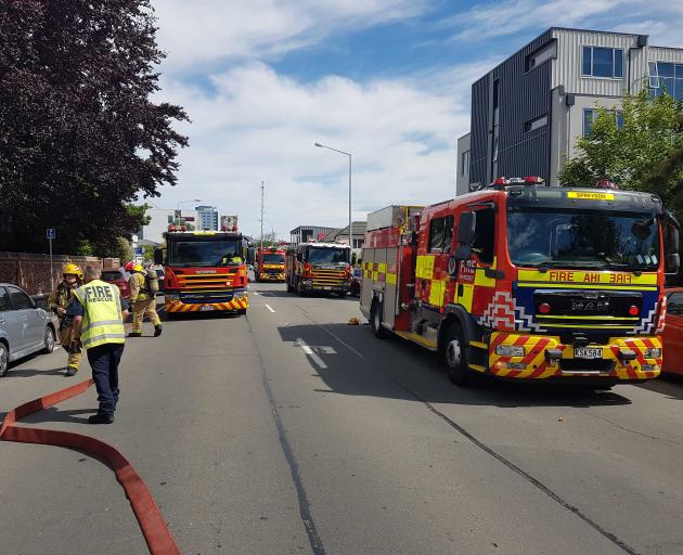 Fire crews at the McLean's Mansion site. Photo: Geoff Sloan