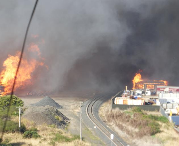 Three buildings are on fire. Photo: Olivia Franklin