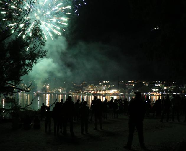 The Queenstown New Year's Eve 2019 fireworks seen from Queenstown beach. Photo: Paul Taylor 
