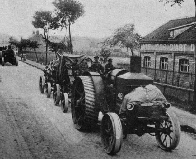 The convoys moving forward into Flanders embrace horse, motor and steam power and all carry full...