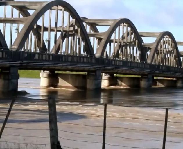 The Clutha River rises closer to the base of the bridge into Balclutha earlier today. Photo: John Cosgrove The Clutha River rises closer to the base of the bridge into Balclutha earlier today. Photo: John Cosgrove