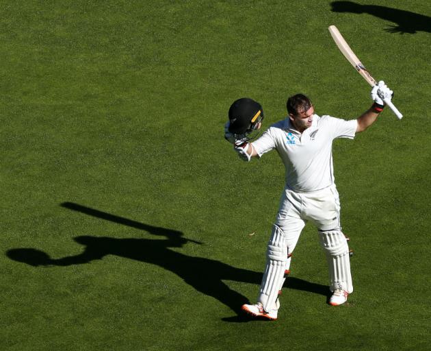 Tom Latham acknowledges the crowd. Photo: Getty Images 
