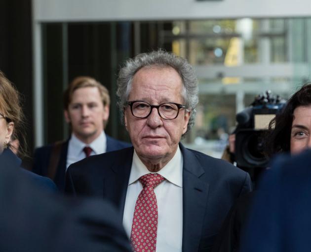 Geoffrey Rush leaves the Supreme Court of New South Wales after being awarded damages in April....