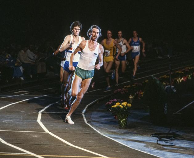 Dick Quax runs in an indoor track meet at the Cow Palace in San Francisco in 1979.