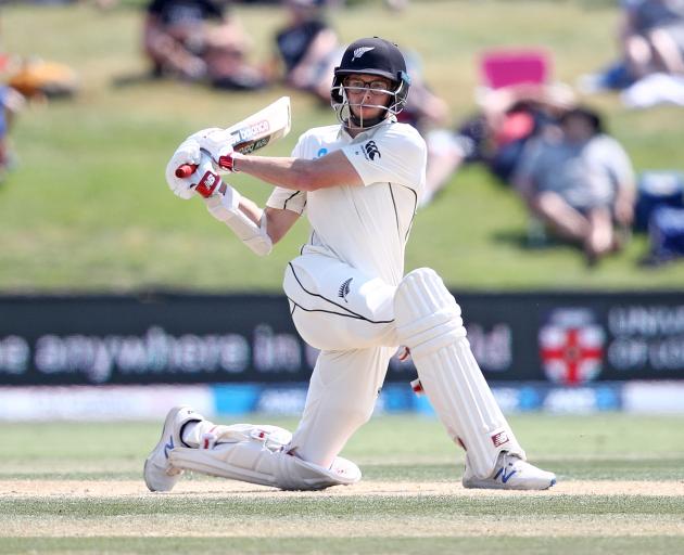 Mitchell Santner struck some lusty blows toward the end of his maiden test century. Photo: Getty...