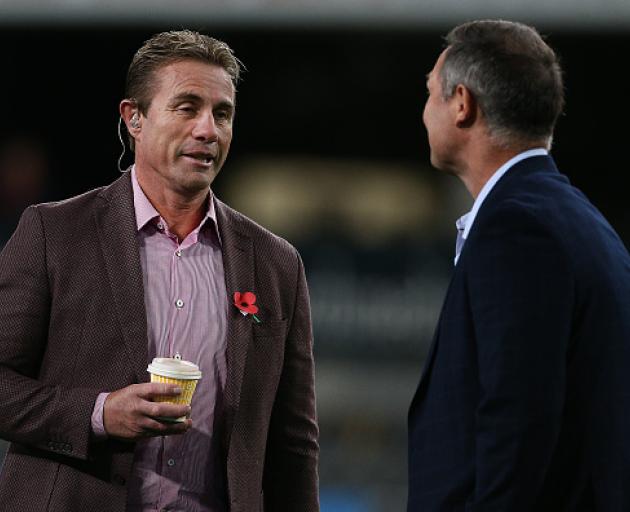 Sky Sport presenter Justin Marshall and Blues coach Leon MacDonald. Photo: Getty Images