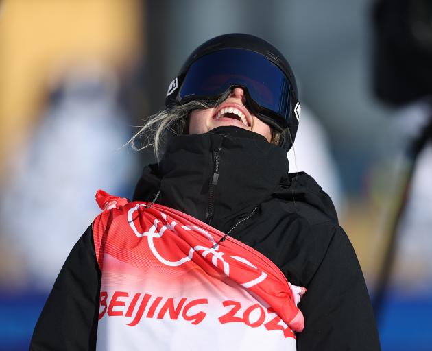 Sadowski-Synnott moments after learning her third and final run had clinched gold. Photo: Getty...