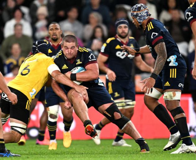 Ethan de Groot on the charge at Forsyth Barr Stadium on Saturday night. PHOTO: GETTY IMAGES 