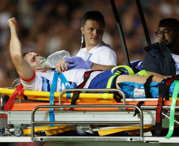 Le Roux Malan is stretchered off after a bad break to his ankle. Photo: Getty Images 