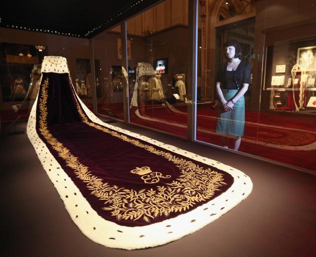 The Queen's coronation robe on display at Buckingham Palace. Photo: Getty Images