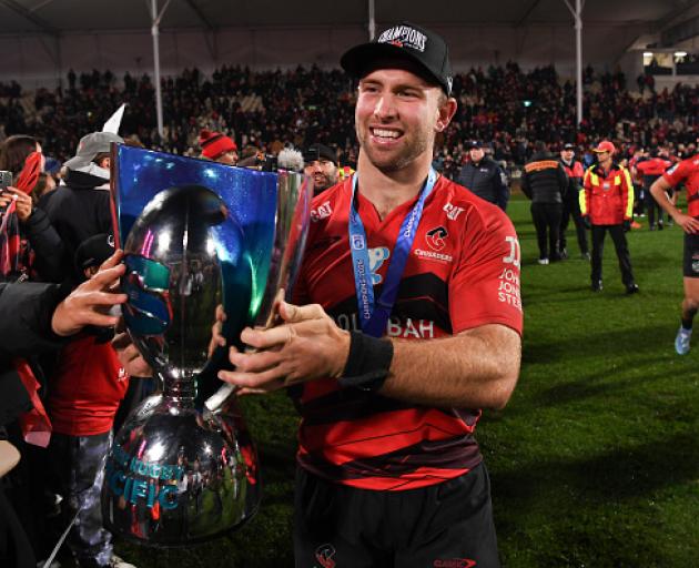 Braydon Ennor celebrating after the Crusaders won the 2025 Super Rugby Pacific title. Photo:...