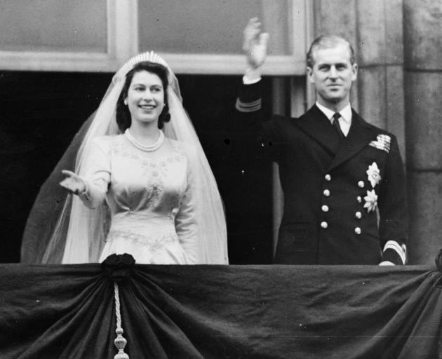 Princess Elizabeth and Prince Philip on their wedding day at Buckingham Palace. Photo: Keystone...