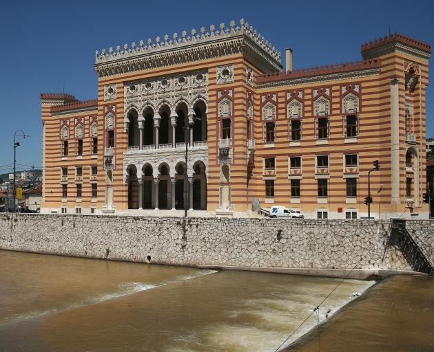 The Sarajevo City Hall  on the banks of the Miljacka River. Photo: Getty Images