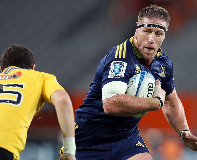 Brad Thorn of the charge for the Highlanders during a Super Rugby against the Hurricanes at...