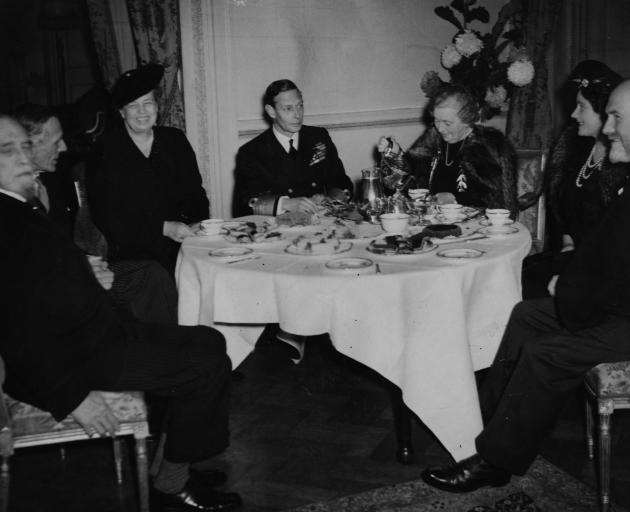 Eleanor Roosevelt (third left) discusses big ideas with George VI of England (centre), Queen Elizabeth (second right) and others in London in 1942. Photo: Getty Images 