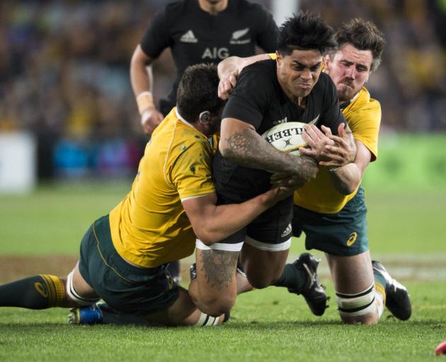 All Black Malakai Fekitoa is tackled during a Bledisloe clash with the Wallabies in Sydney last year. Photo: Getty Images All Black Malakai Fekitoa is tackled during a Bledisloe clash with the Wallabies in Sydney last year. Photo: Getty Images