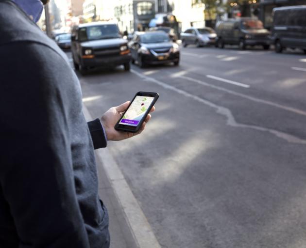 Uber is withdrawing from Canada's second-most populous province as it also battles a decision to strip the company of its license to operate in London. Photo: Getty Images 