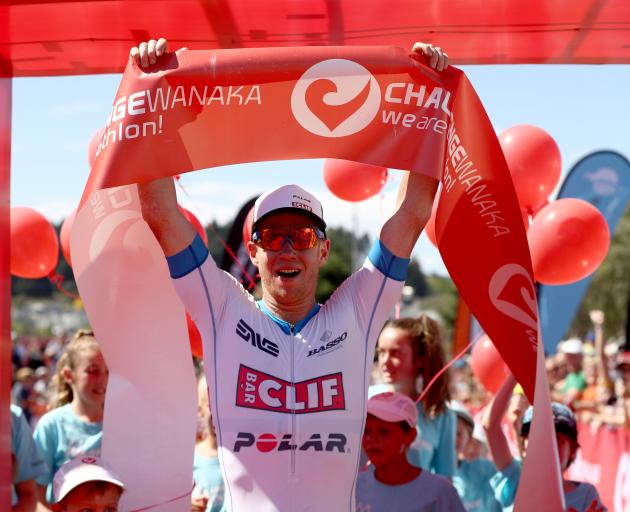 Dougal Allan celebrates at the race finish line. Photo: Getty Images 