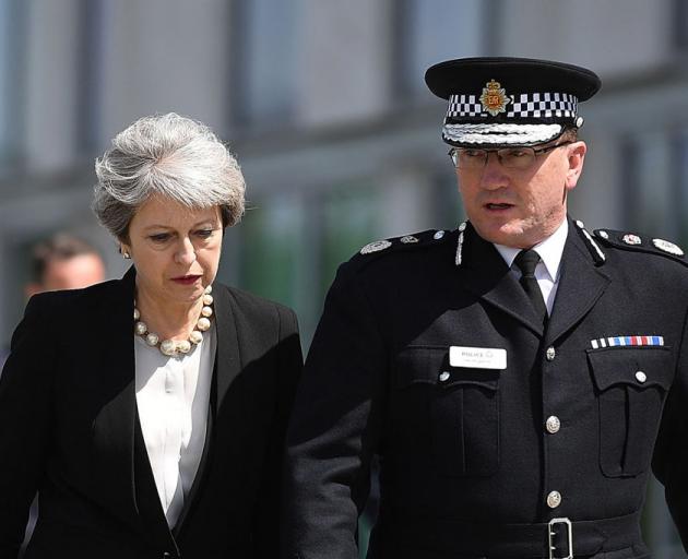 Prime Minister Theresa May with Ian Hopkins, the Chief Constable of Greater Manchester Police....