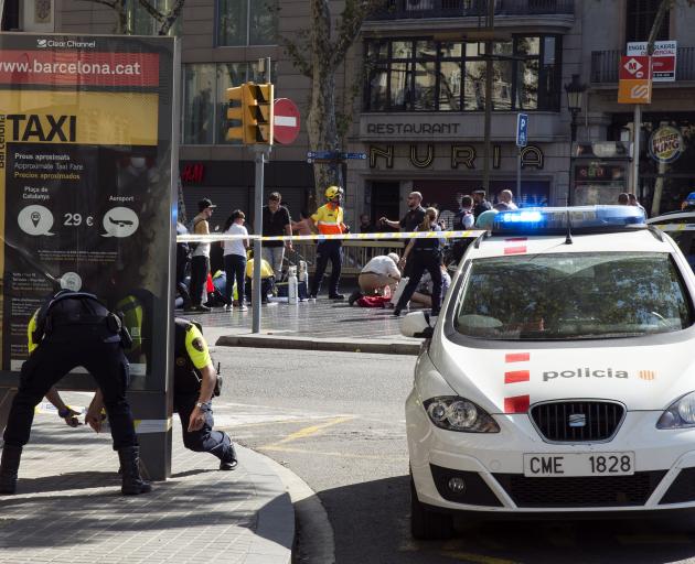 Police investigate the scene of the attack. Photo: Getty Images 