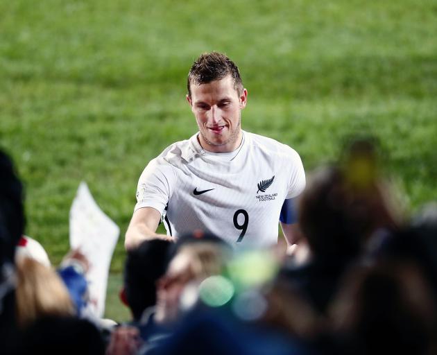 Chris Wood acknowledges supporters after the All Whites won their qualifying match against the Solomon Islands last month. Photo: Getty Images 