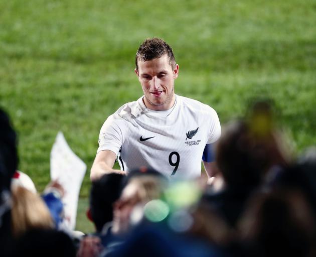 Chris Wood acknowledges supporters after the All Whites won their qualifying match against the Solomon Islands last month. Photo: Getty Images