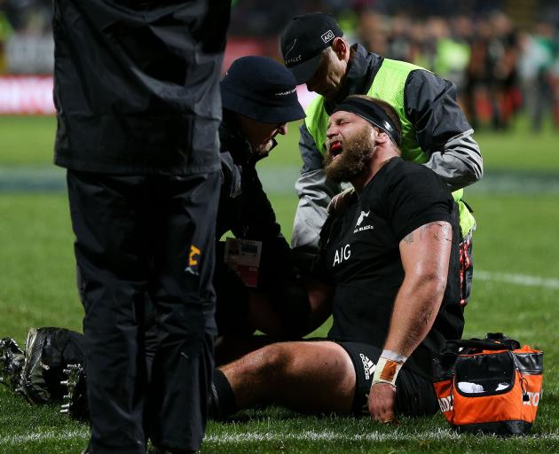 Medics work on Joe Moody's dislocated shoulder during the match. Photo: Getty Images 