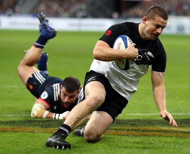 Dane Coles scores the opening try against France. Photo: Getty Images