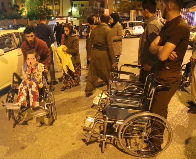 Wounded people arrive to receive treatment at Sulaymaniyah Hospital in northern Iraq. Photo:...