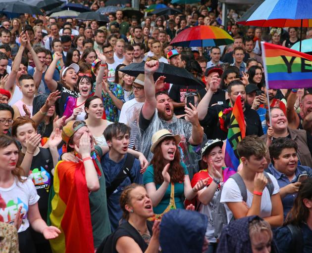 Supporters of the 'Yes' vote for marriage equality celebrate at Melbourne's Result Street Party yesterday. Photo: Getty Images