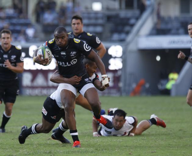 Makazole Mapimpi races away to score one of two tries for the Sharks in Durban. Photo: Getty Images