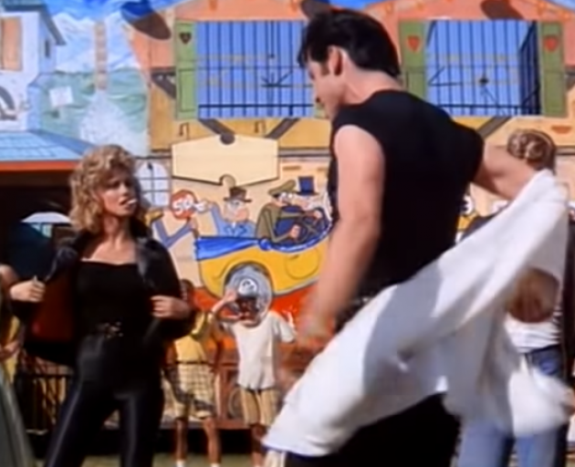Olivia Newton John as the transformed Sandy in Grease with John Travolta. Photo: YouTube 