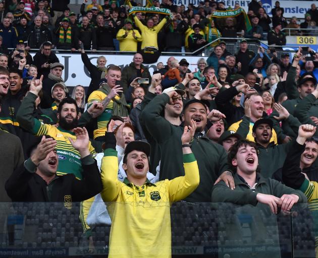 Grizzlies fans make some noise in the stands at Forsyth Barr Stadium.