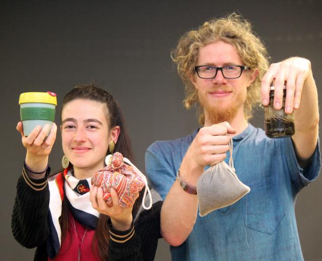 No-waste nomads Liam Prince and Hannah Blumhardt with some of their favourite tools to ward off...