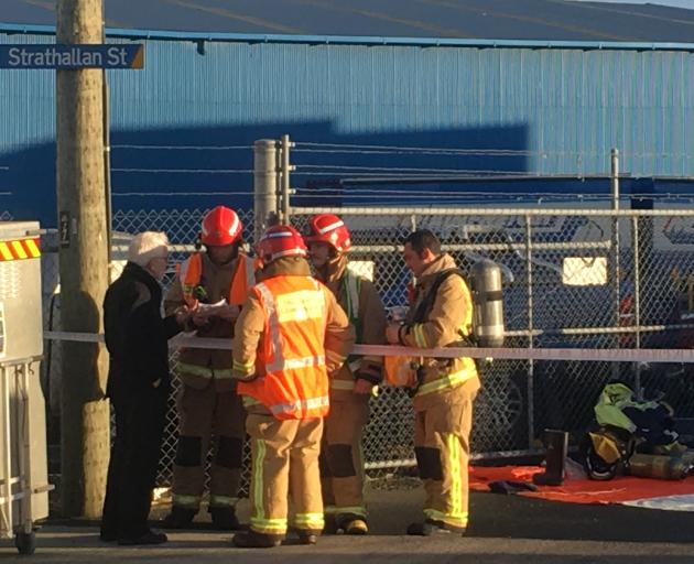 Otago University chemistry professor Lyall Hanton speaks to firefighters. Photo: George Block