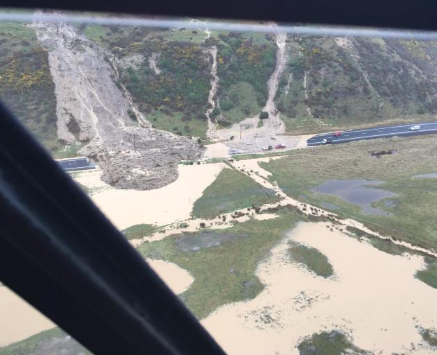A massive slip on Harington Point Rd, near Harwood, on Saturday. Photo: Dunedin Civil Defence...