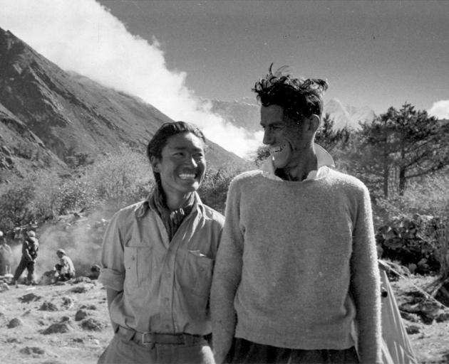 Tenzing Norgay and Ed Hillary relax after conquering Everest. Photo: Rupert Taylor-Price