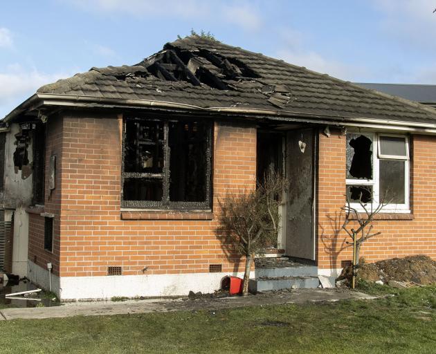 The Hoon Hay house was badly damaged by the fire. Photo: Geoff Sloan