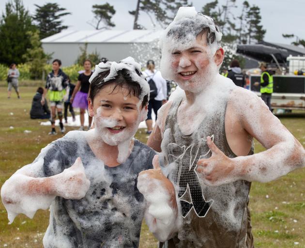 Phoenix Tauakume and Liam Mark, of Russley School, enjoyed the bubble bath obstacle. Photo: Geoff...